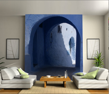 Invitation au voyage dans son salon avec un mur d'image aux couleurs de rêves de l'ile de Santorin