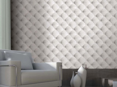 papier peint Koziel trompe l'oeil pour un effet cuir capitonné blanc. Peut être posé dans le salon ou le chambre pour un effet boeuf