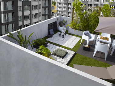 Déco de terrasse en ville ambiance zen et minimaliste avec un sol couvert de dalles de gazon synthétique et carrés de galets blanc.