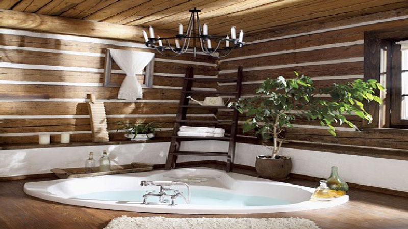 La tendance déco pour la salle de bain est au bois. clair, naturel, exotique avec une baignoire ïlot, des vasques blanches, le bois est à l'honneur dans la salle de bain