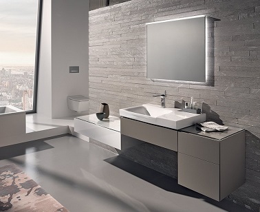 Une salle de bain design esthétique et moderne ! Dans cette salle de bain design avec mur en pierre de parement le meuble sous vasque offre des rangements tout en apportant un effet déco moderne. Déstructuré et aérien il n'encombre pas l'espace.