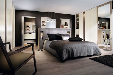 Une suite parentale contemporaine chic Dans cette suite parentale la salle de bain est simplement cachée derrière un petit mur. Un aménagement simple dans cette chambre adulte ultra moderne.