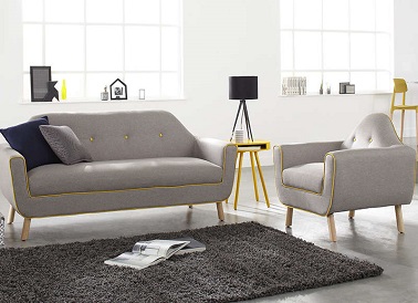 Un duo canapé fauteuil pour aménager un joli salon design La tendance vintage n'est pas incompatible dans un salon design. Ce canapé en tissu gris en est la preuve car il adopte un style et une forme moderne et rétro à la fois.