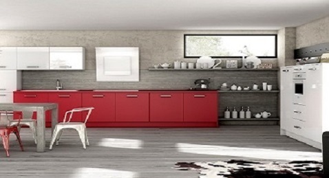 Une cuisine contemporaine minimaliste et industrielle avec du rouge.