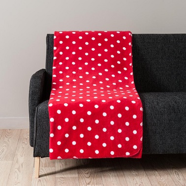 Un plaid polaire rouge à pois blancs original et mignon.