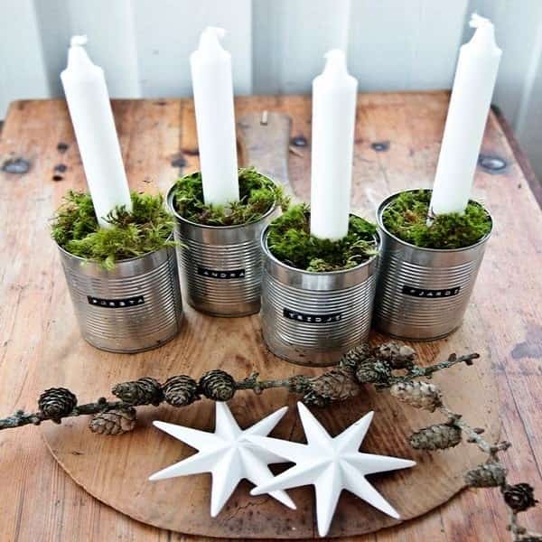 Des boites de conserve recyclées en bougeoirs originaux pour Noël.