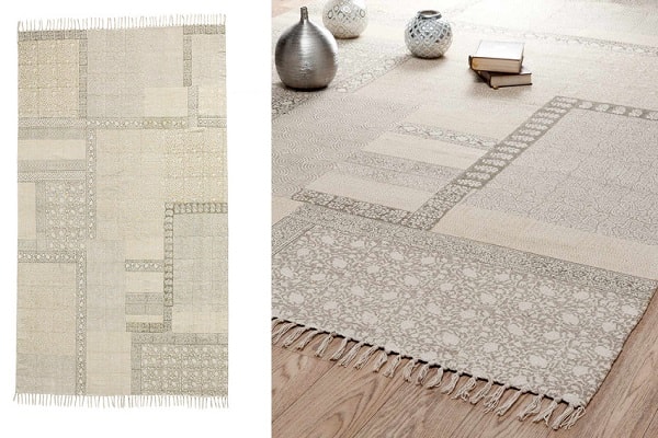 Un tapis discret pour une déco délicate et chaleureuse à l'intérieur par Maisons du Monde.