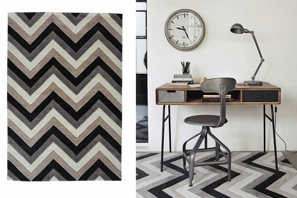 Un motifs chevrons sur un tapis à poils courts noir blanc gris par Maisons du Monde.