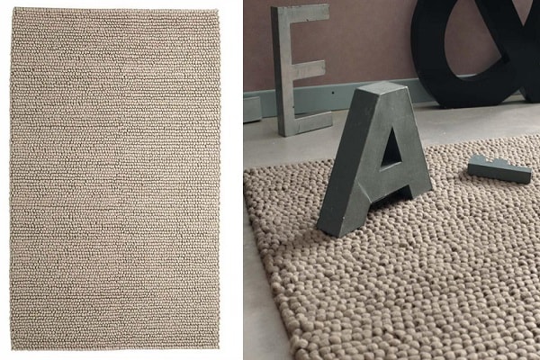 Un tapis tout doux en laine et coton couleur beige douce et naturelle.