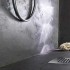 Relooker sa salle de bain avec du béton minéral et l'effet déco est immédiat ! Un béton ciré sous forme d'enduit parfait dans une douche italienne, sur les murs et le sol en carrelage ou brut