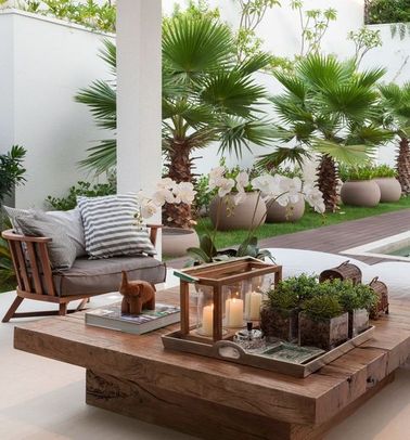 Aménager une terrasse lounge avec de la verdure et du bois