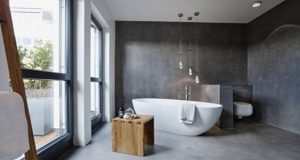 Idéal pour relooker la salle de bain en un rien de temps, le béton ciré fait la déco sur les murs et le sol de la salle de bain pour une pièce ultra tendance