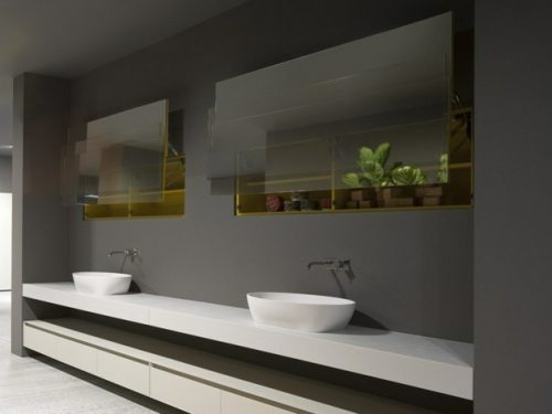 double miroirs rectangulaires au dessus d'une salle de bains à double vasques